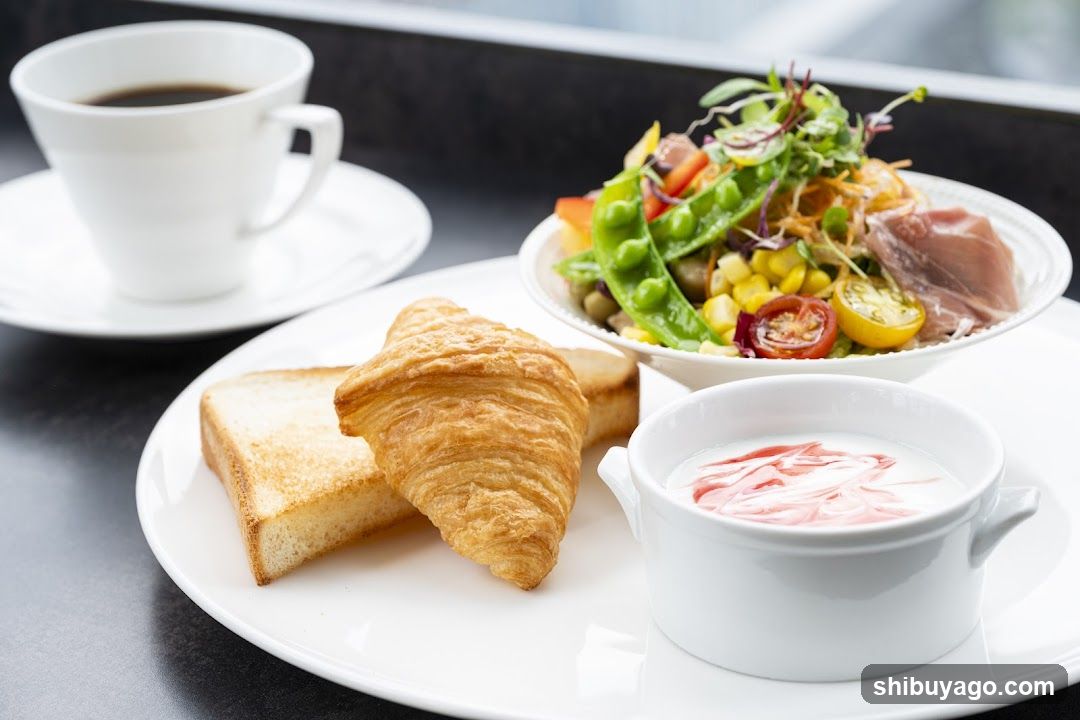 Breakfast Spread with Croissant and Salad
