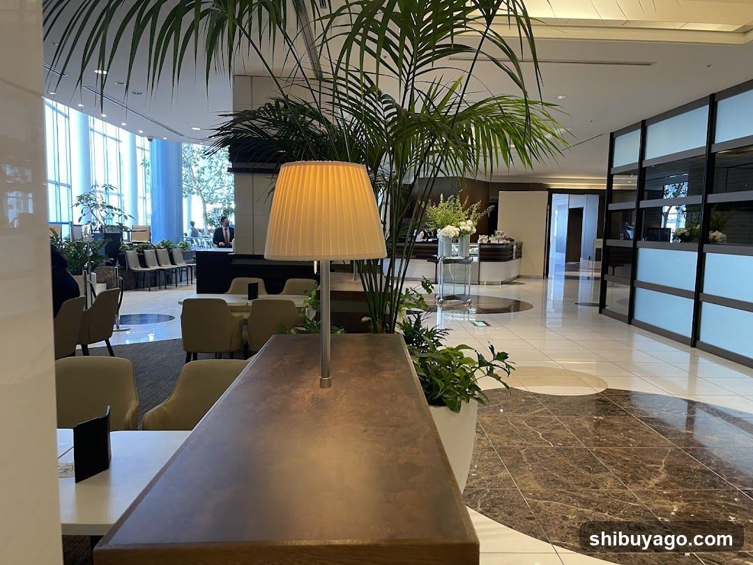 Lobby Interior with Plants and Seating Area