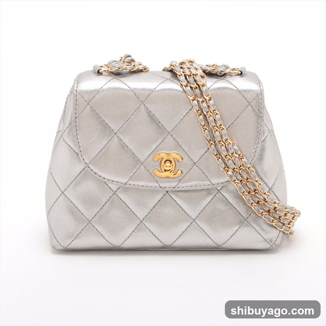 Chanel Silver Quilted Chain Bag