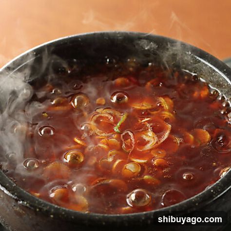 Spicy Broth with Snails