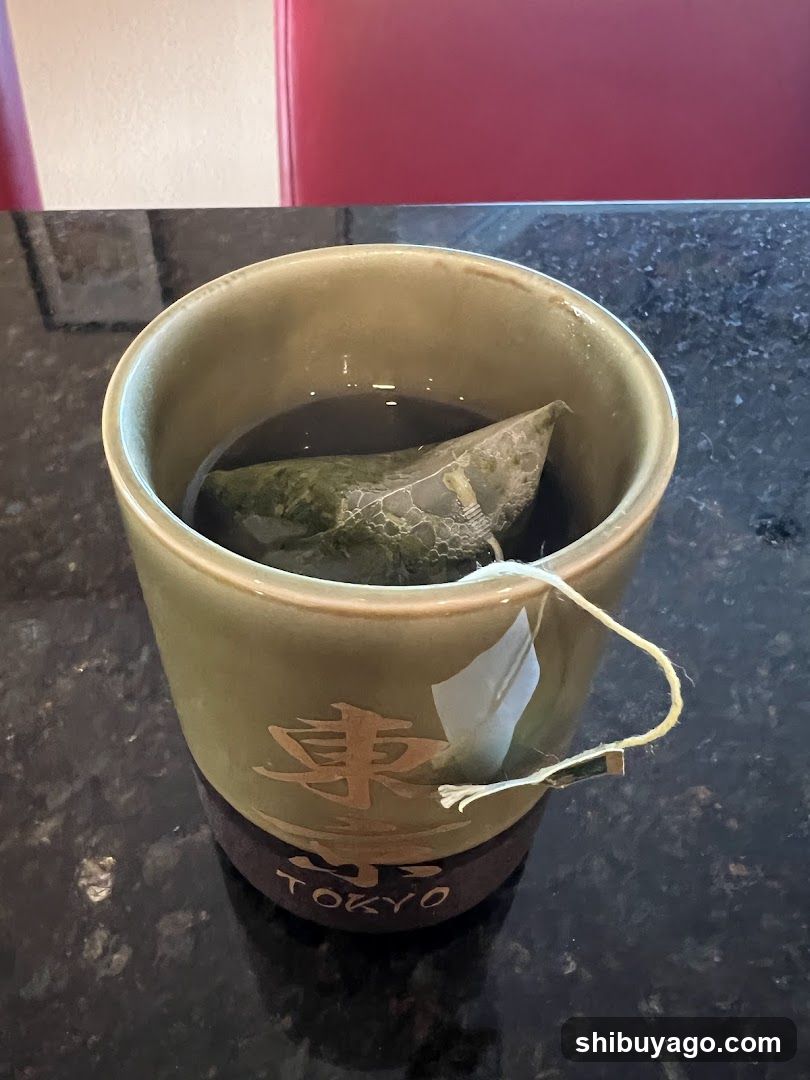 Tea in ceramic cup with tea bag