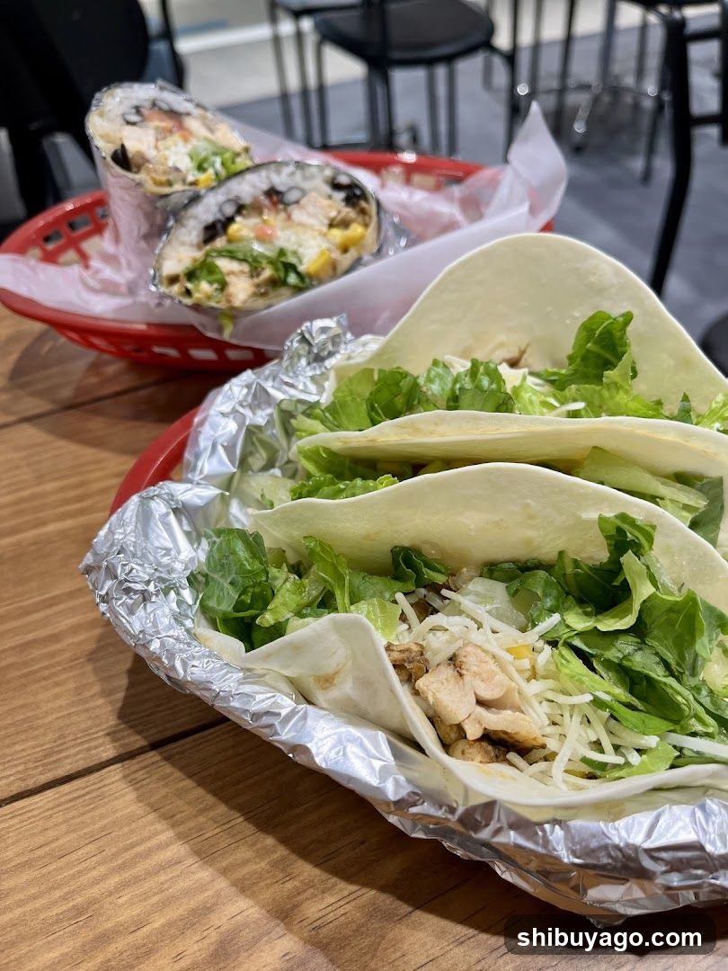 Tacos and Burritos on a Table