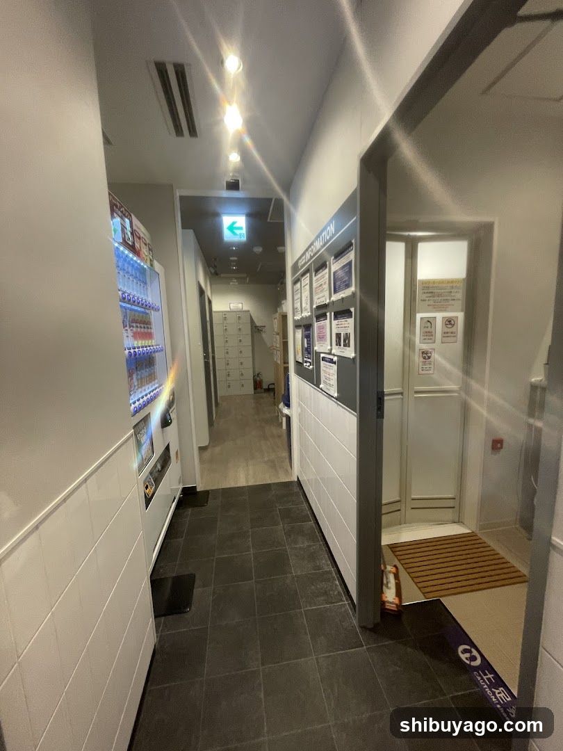 Interior hallway with vending machine and information board