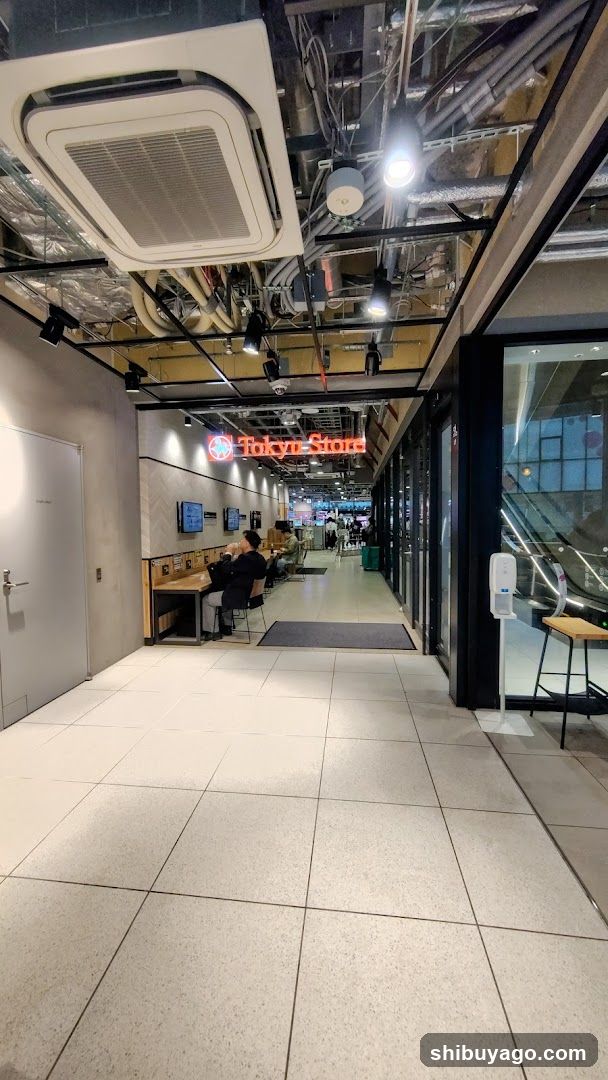 Interior of a commercial space with Tokyo Store sign