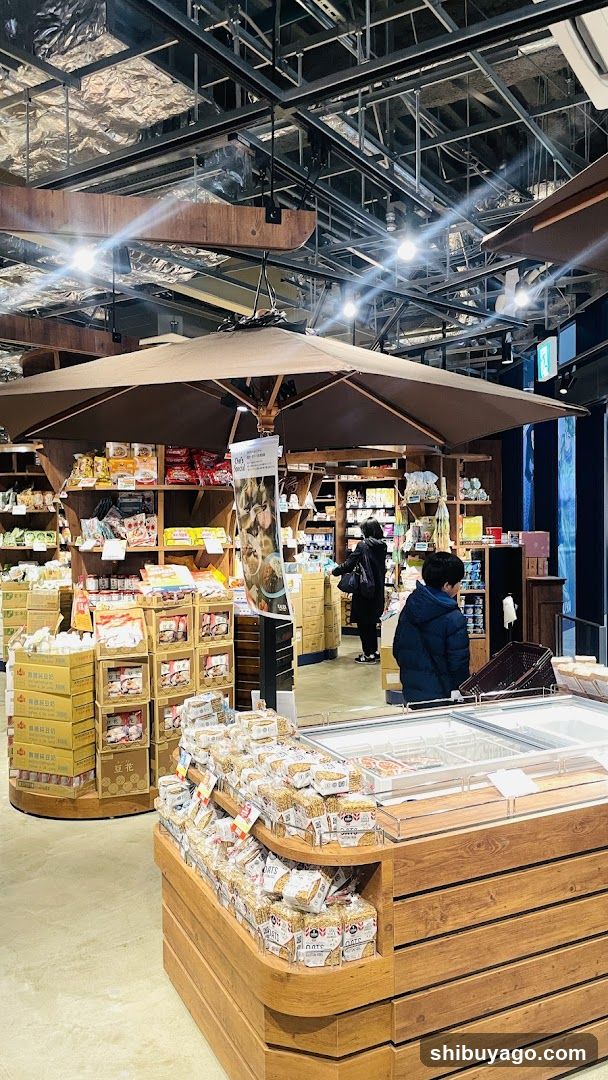 Interior of a food store with wooden displays and shelves
