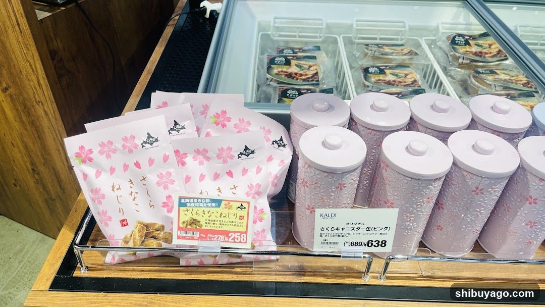 Sakura-themed snacks and containers in a store display