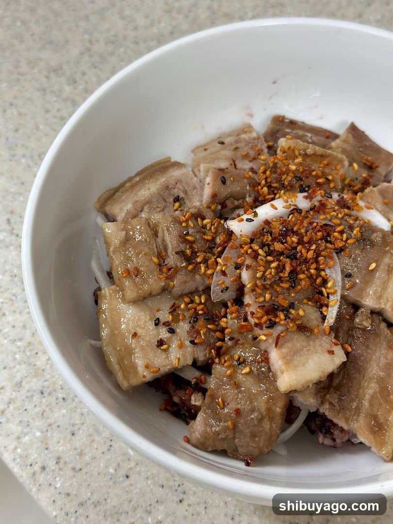 Bowl of Meat with Sesame Seeds