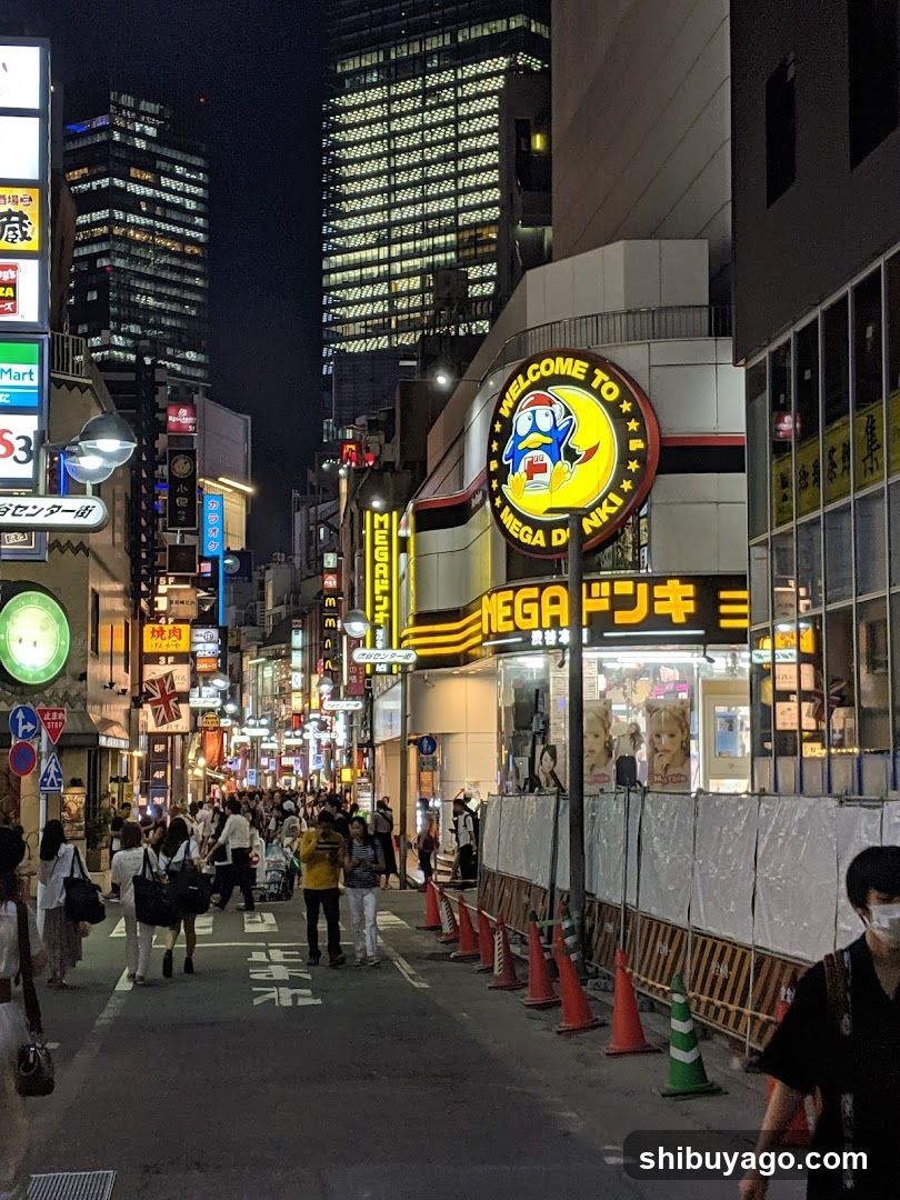 Night street scene with Mega Donki storefront