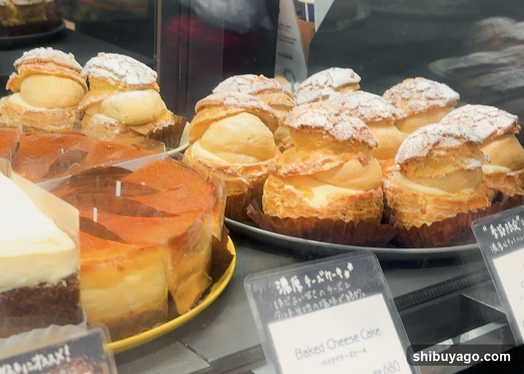 Baked Cheese Cake and Cream Puffs Display