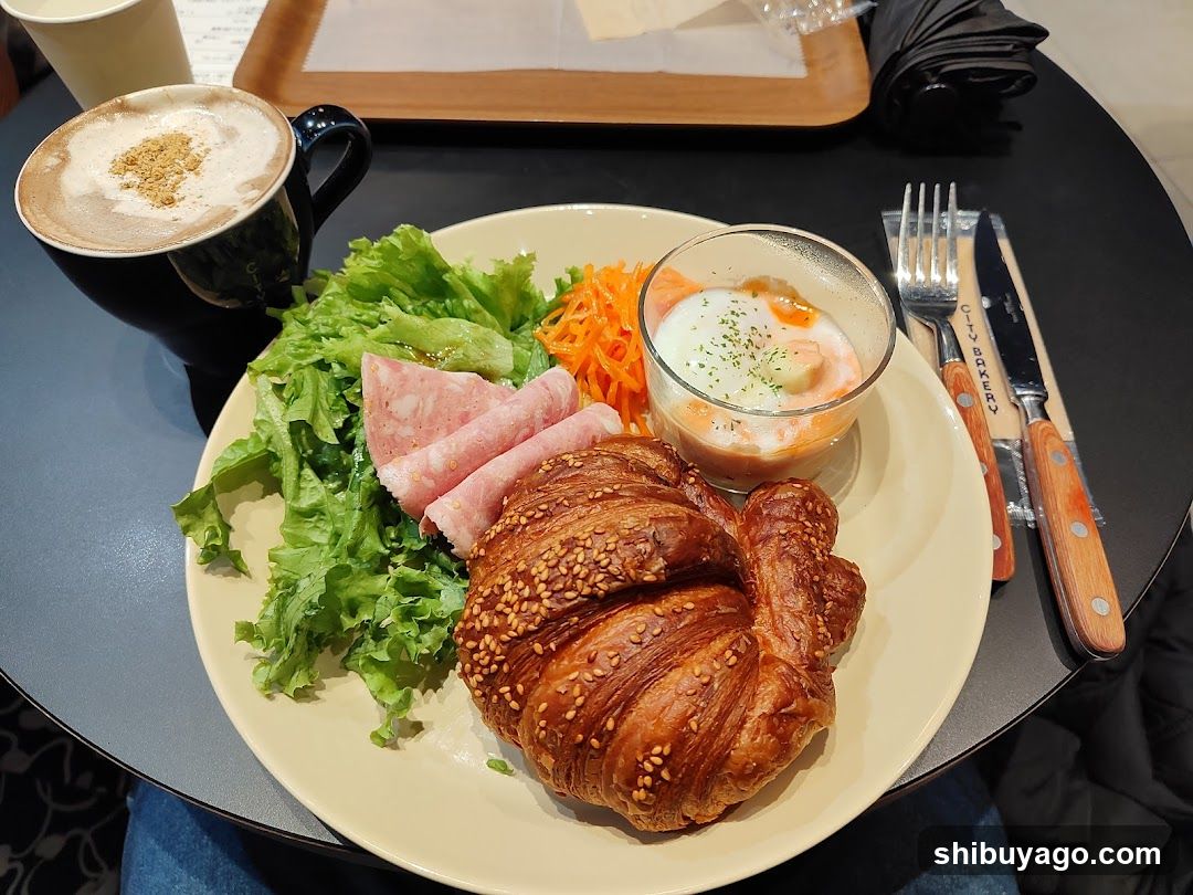 Breakfast Plate with Croissant and Coffee