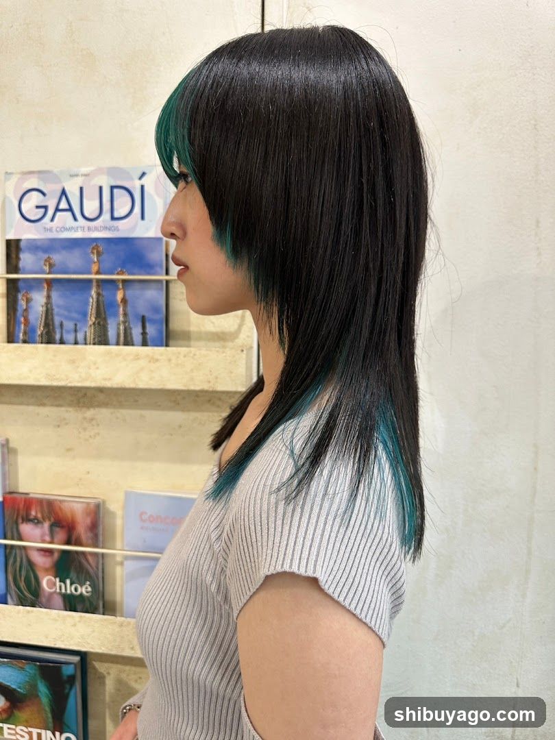 Hair with teal highlights