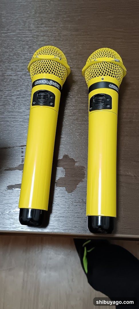 Yellow Microphones on Table