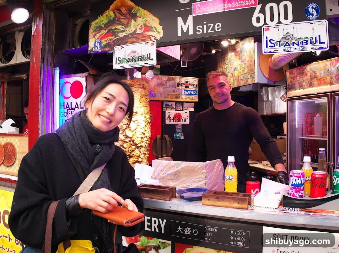 Street Food Stall with Staff and Customer