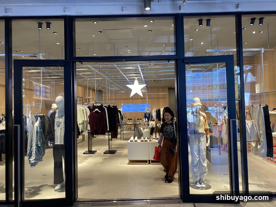 Clothing Store Interior View Through Glass Doors