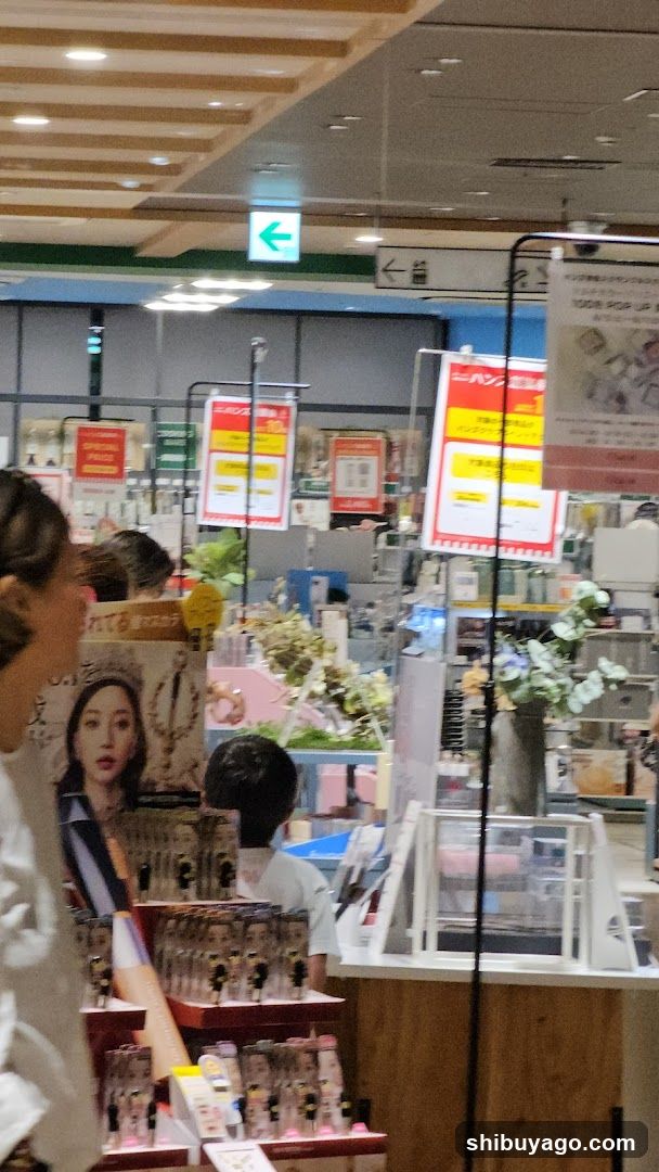 Interior of a retail store with product displays and signage