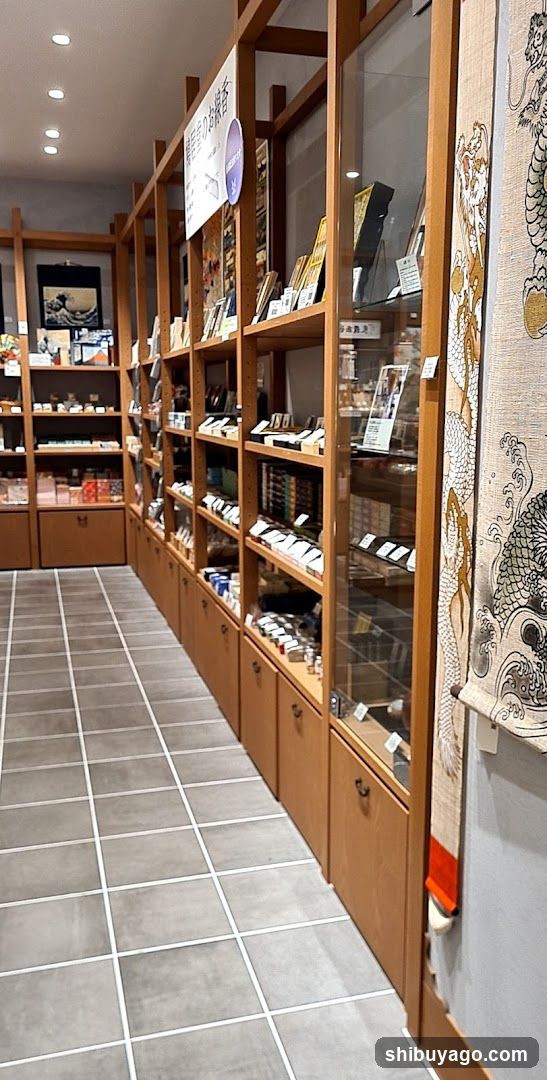 Interior of a shop with wooden shelves and glass display cases.