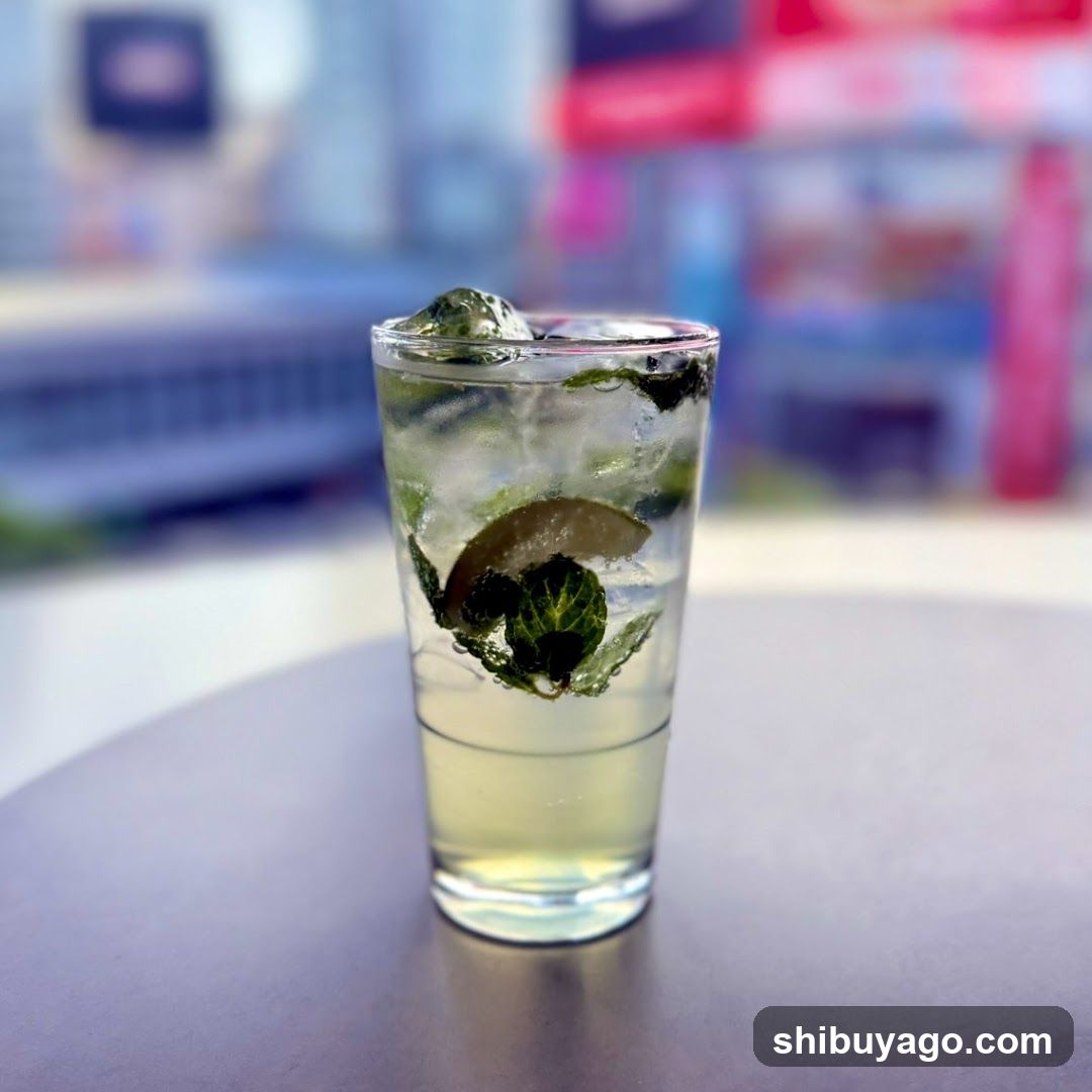 Mojito-style cocktail in a shot glass