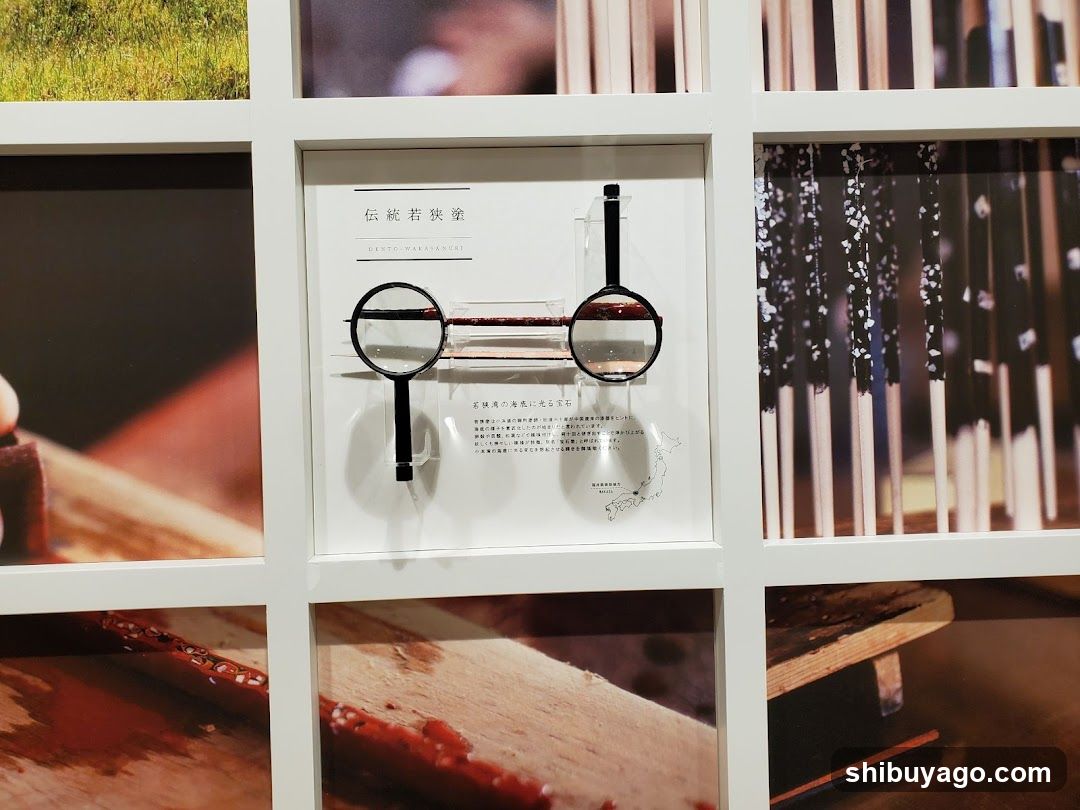 Exhibition Display with Magnifying Glasses and Text Panels