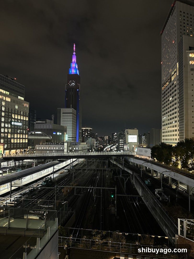Night Cityscape with Illuminated Tower