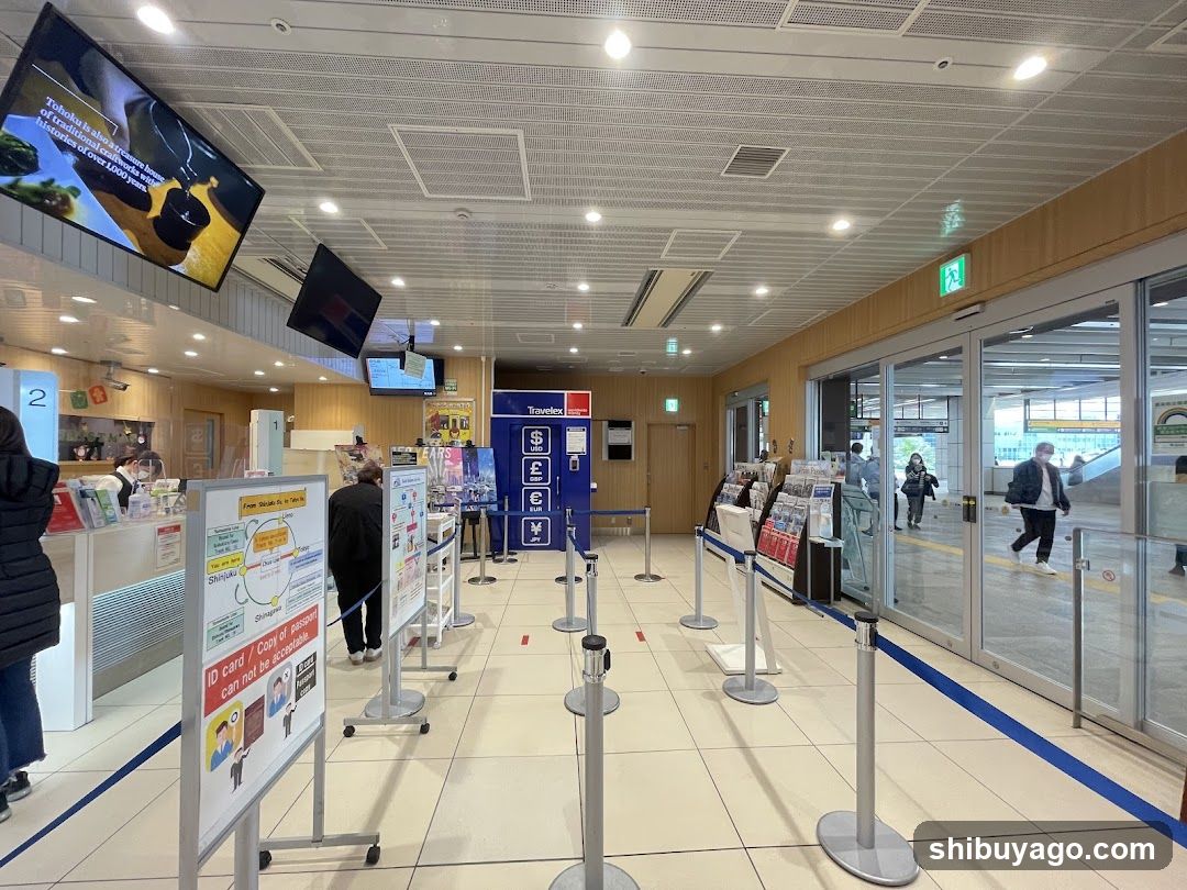 Station Interior with Queuing Area and Information Displays