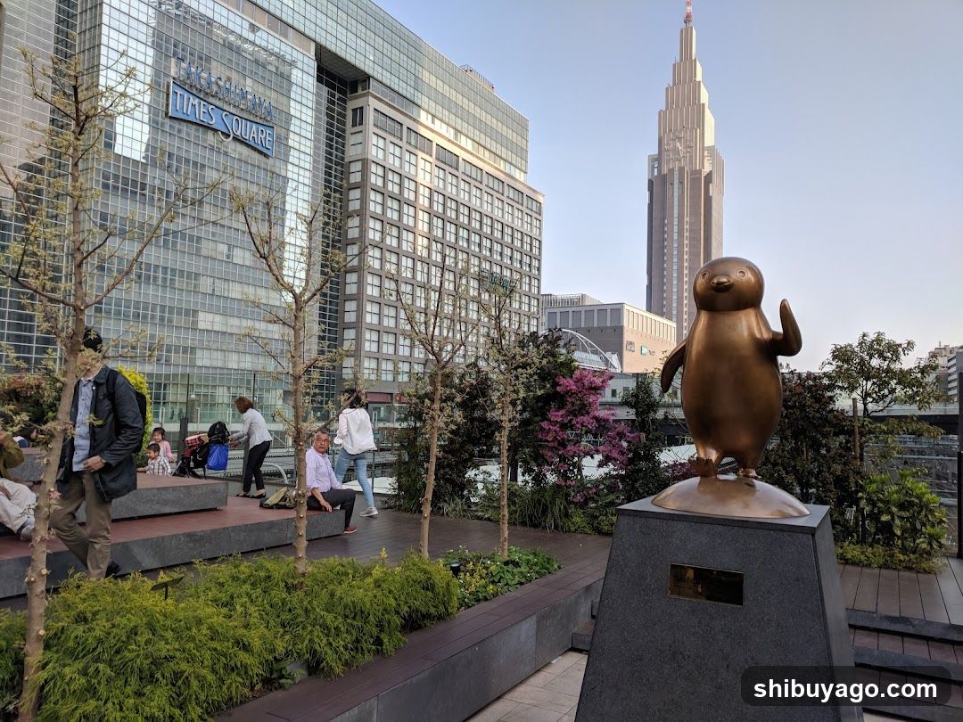 Times Square Rooftop View with Penguin Statue
