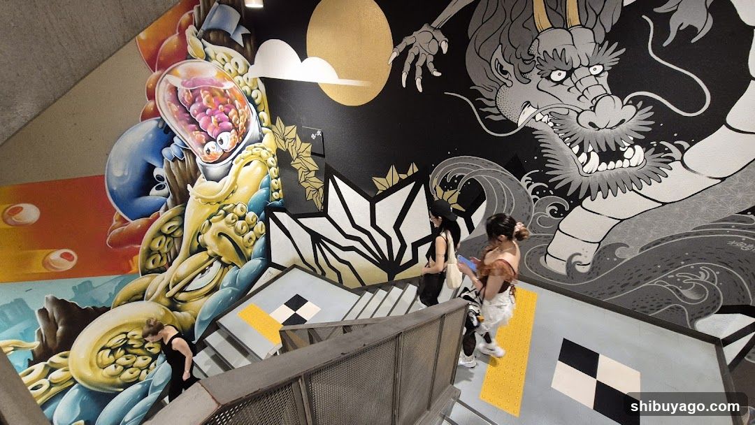 Staircase mural with dragon and abstract art
