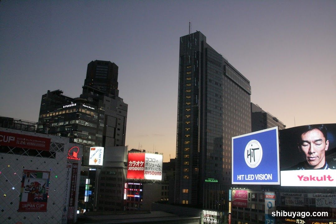 Urban Night Scene with Billboards and Buildings