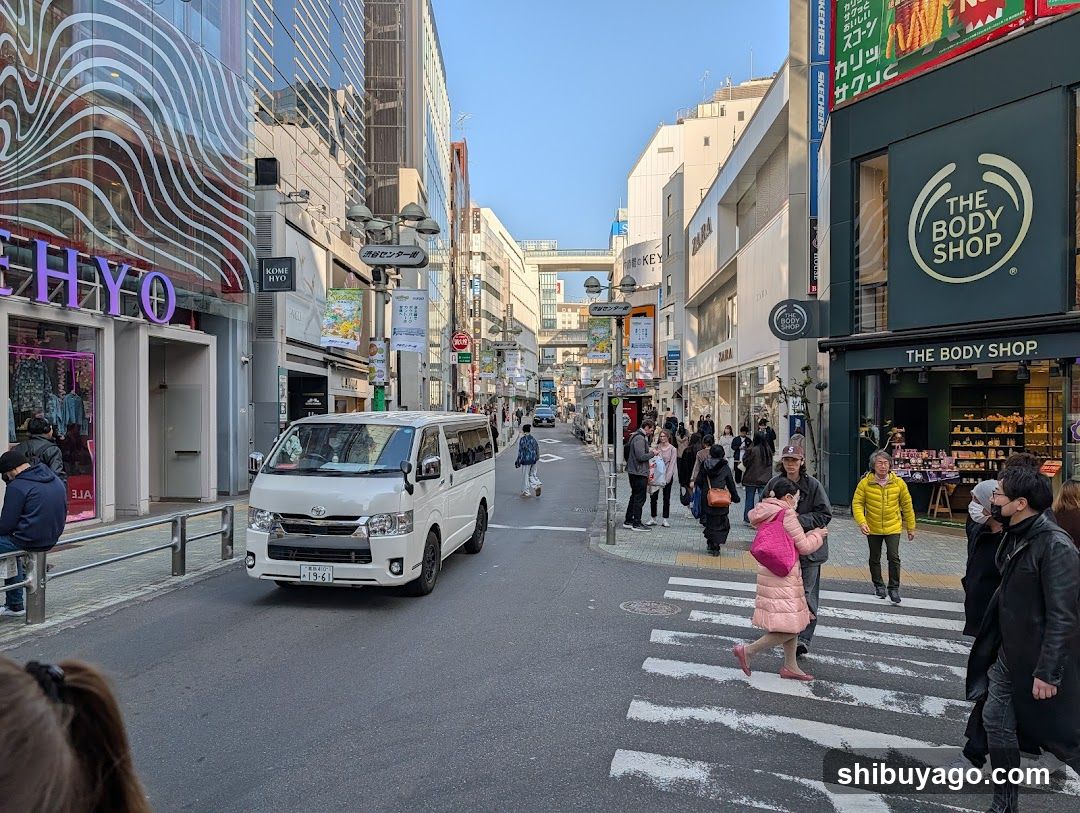 Street scene with shops and pedestrians