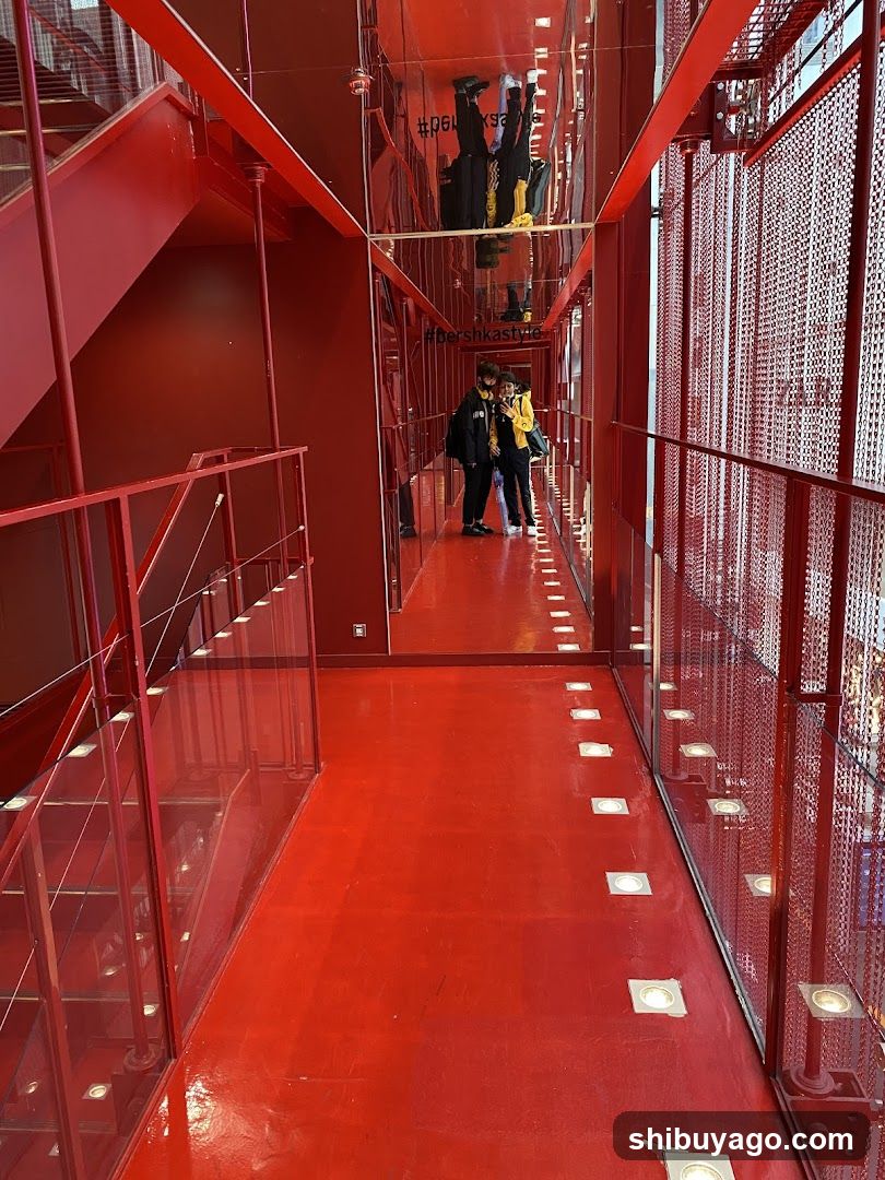 Red Interior Corridor with People
