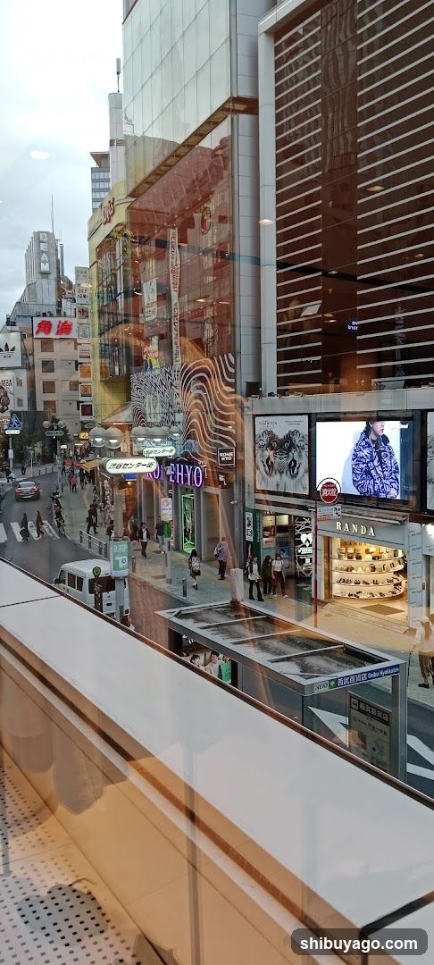 Urban Street View with Storefronts and Billboards