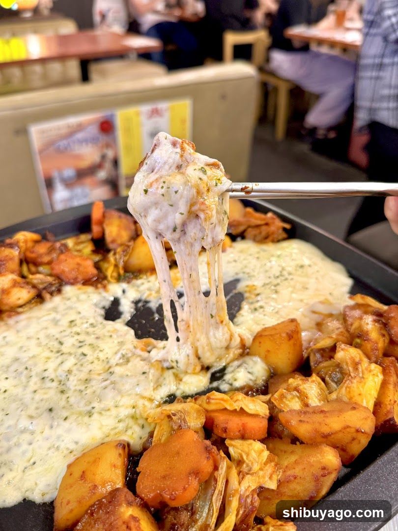 Cheesy Potato Dish with Tongs