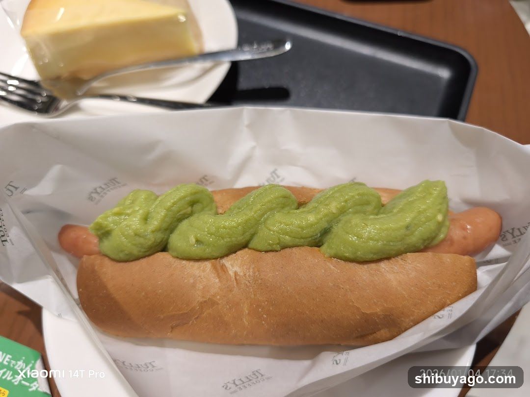 Hotdog with green sauce and cheese dessert