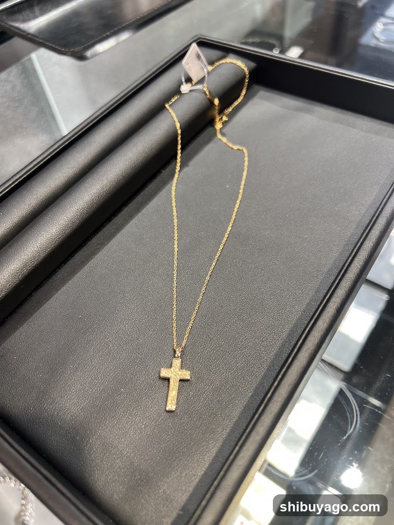 Gold Cross Necklace Display