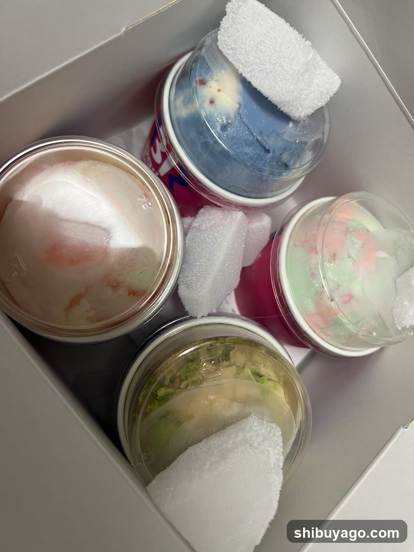 Takeout Box with Cold Drinks and Food