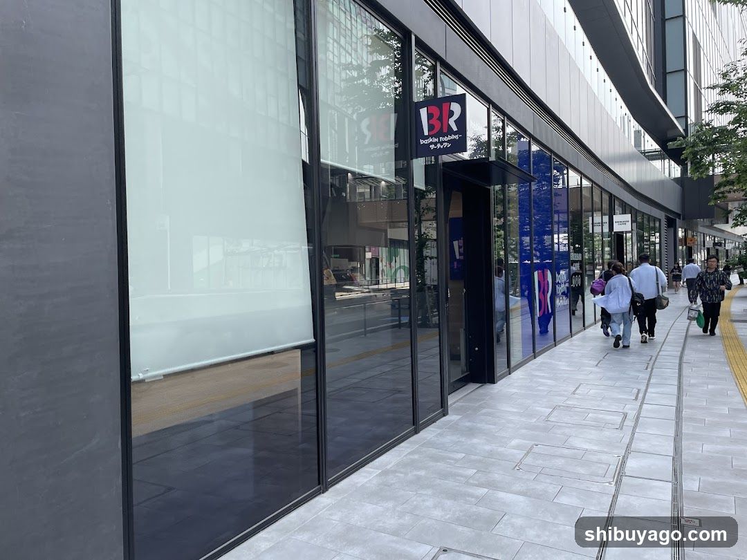 Modern storefront with glass facade and signage