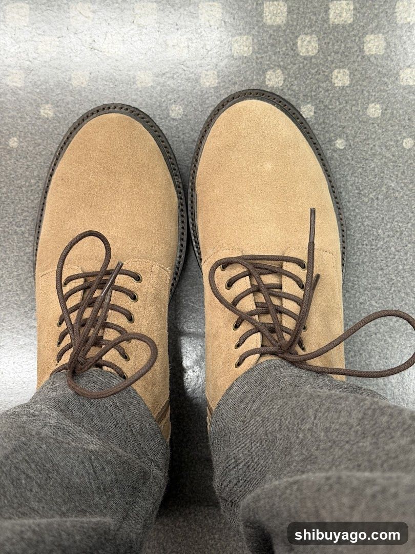 Suede Boots on Grey Floor