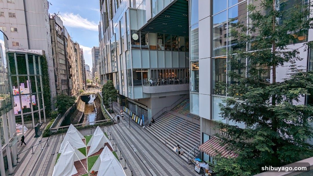 Urban plaza with modern architecture and canal