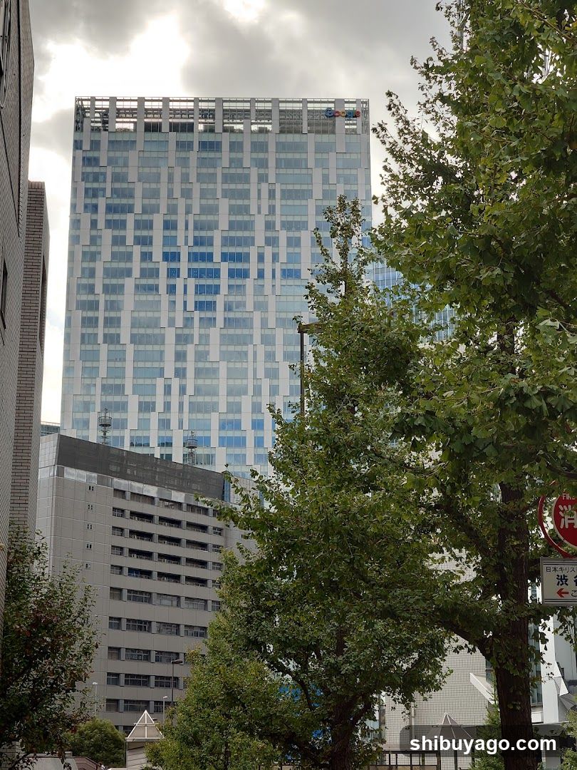 Cityscape with tall building and trees
