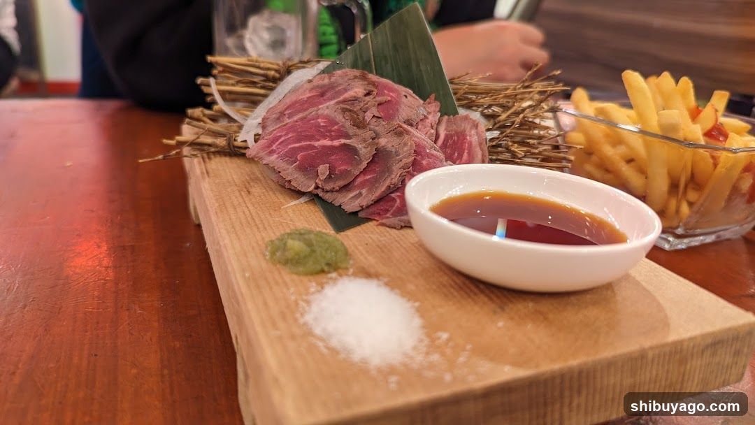 Sliced Beef with Dipping Sauce and Fries