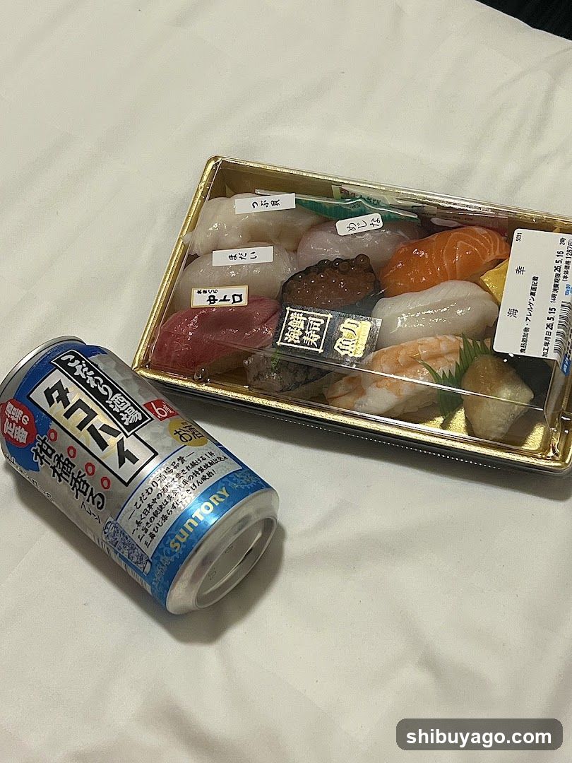 Sushi and Beer on Bed
