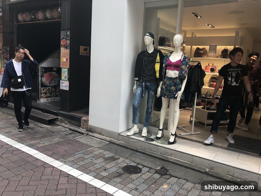 Street Scene with Storefronts and Pedestrians