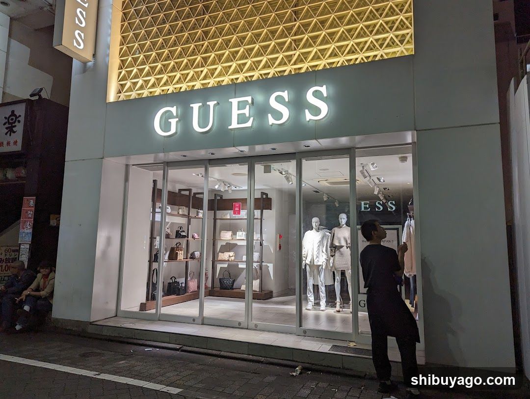 GUESS Storefront at Night