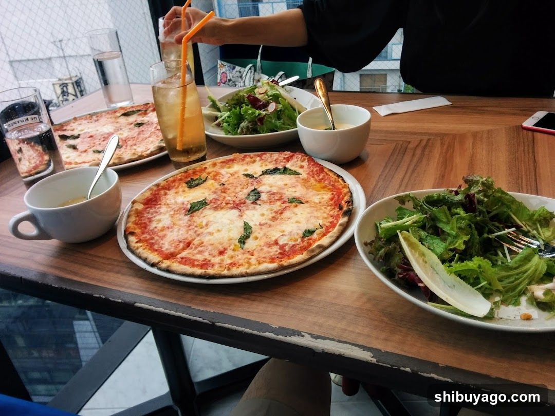 Pizza and Salad at a Cafe