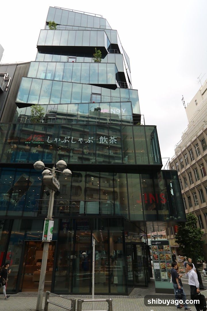 Modern Glass Building with Shop Entrance