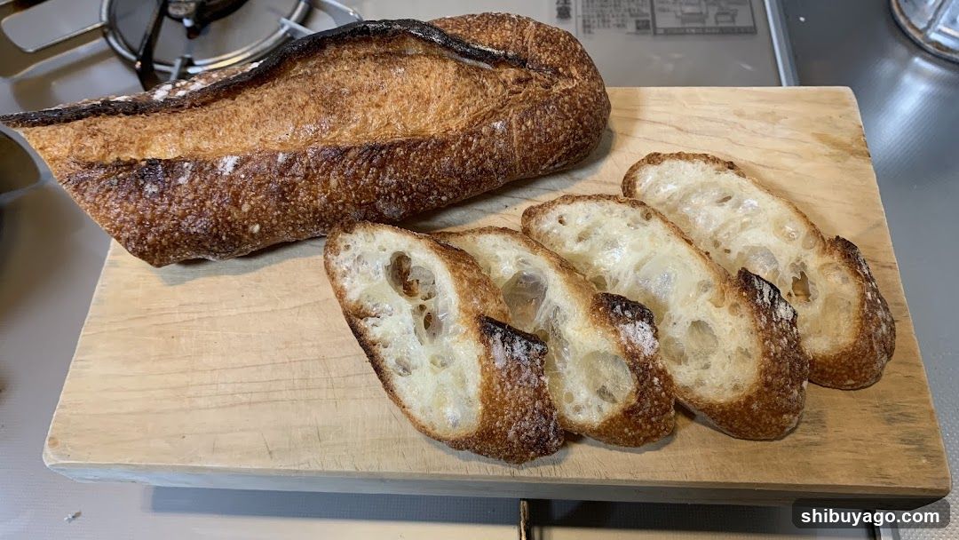 Sliced Baguette on Wooden Board