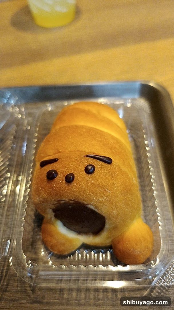 Chocolate Croissant with Face Design