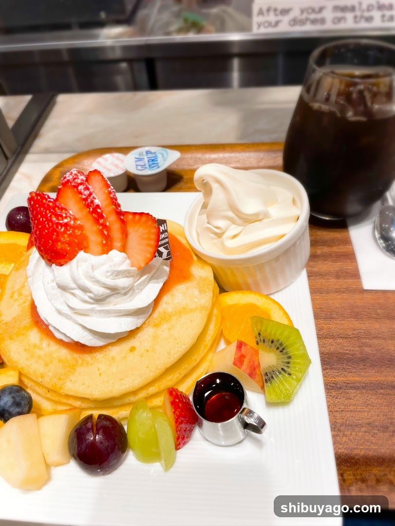 Breakfast with Pancakes and Fruits
