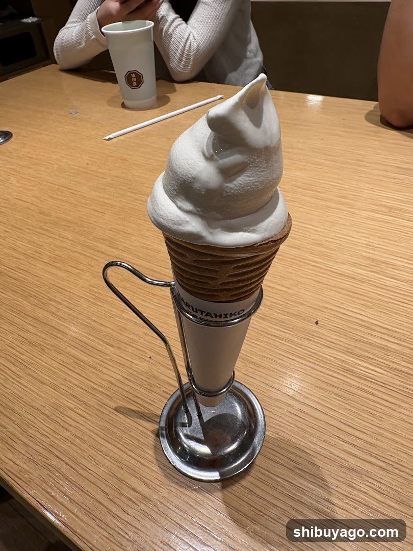 Soft-serve ice cream in a cone