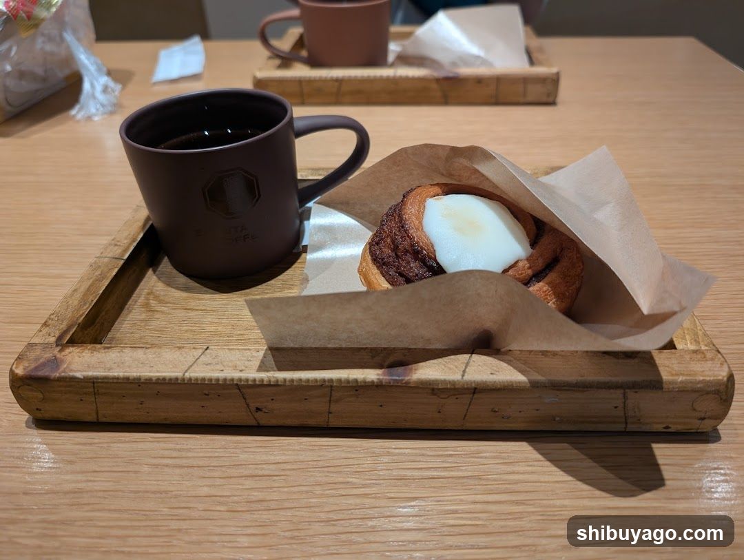 Coffee and Pastry on Wooden Tray