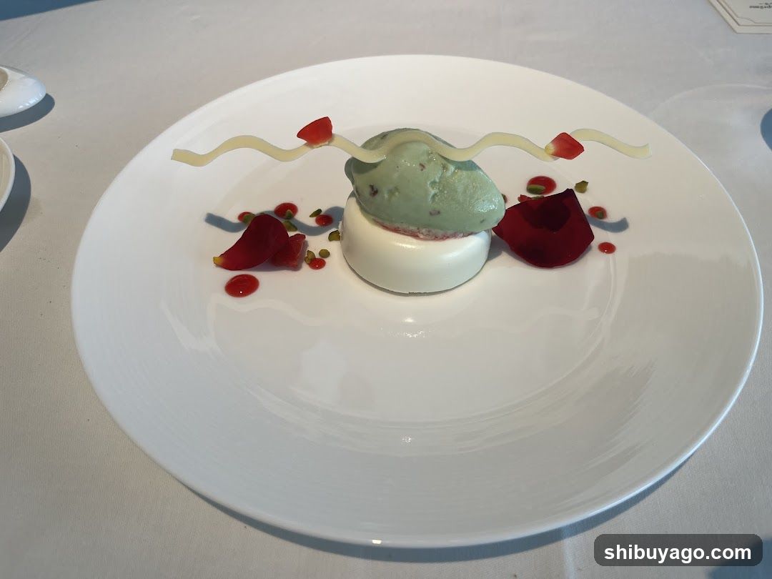 Dessert with Green Ice Cream and Red Garnish
